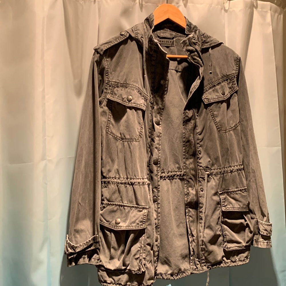 Gray, lightly worn jacket.